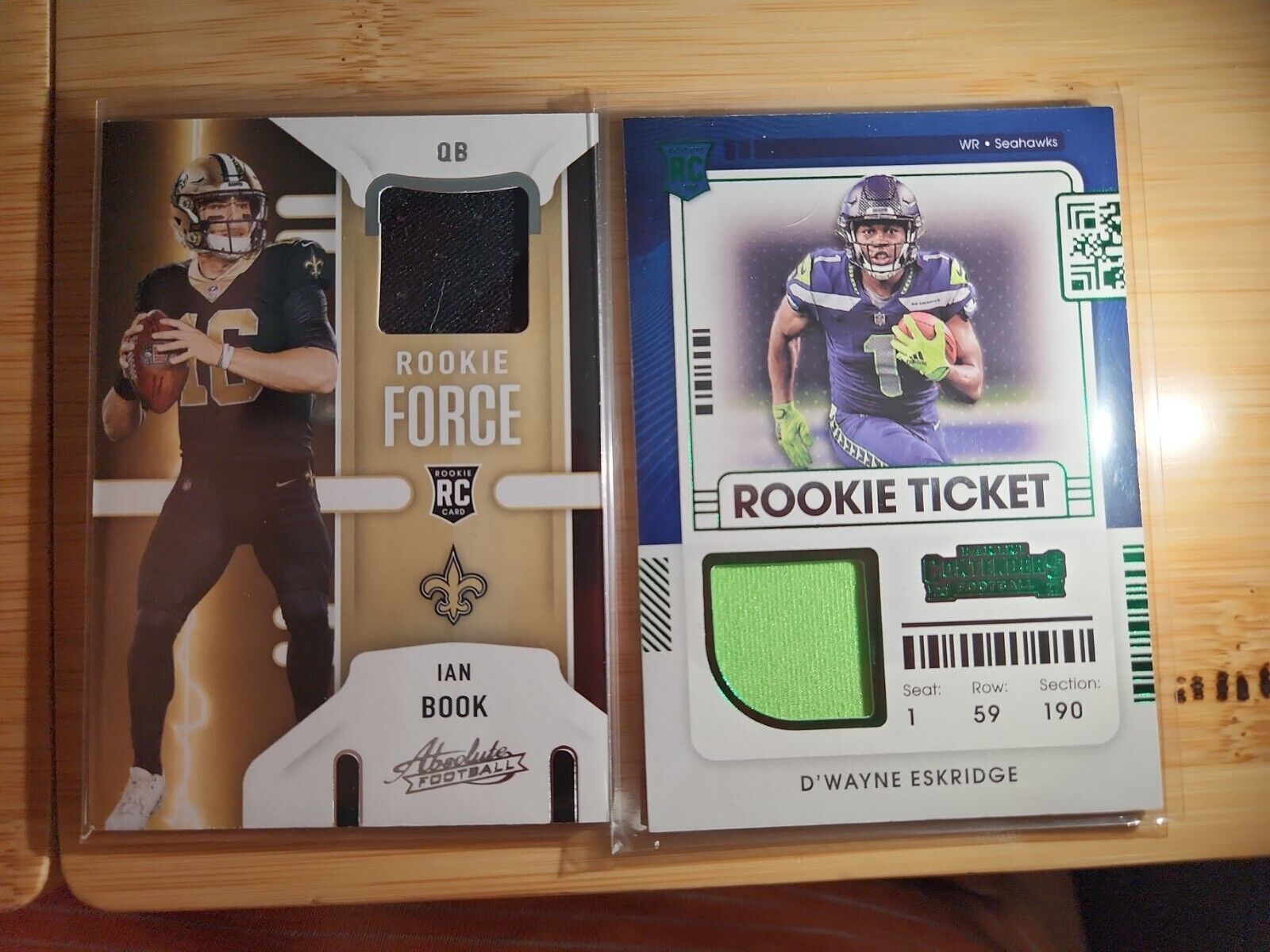 2021 Panini Absolute Ian Book and D'wayne Eskridge patch cards